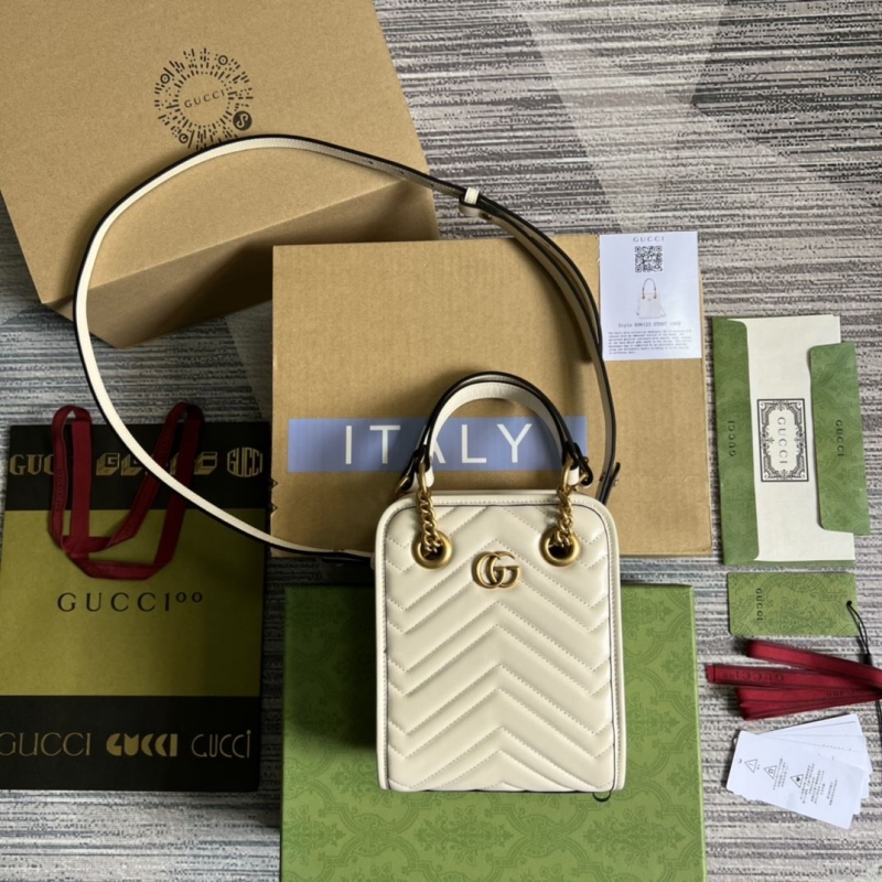 G*u*i top handle bags